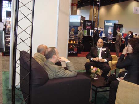 Edward Lehman and Lucy Wang meet with colleagues.